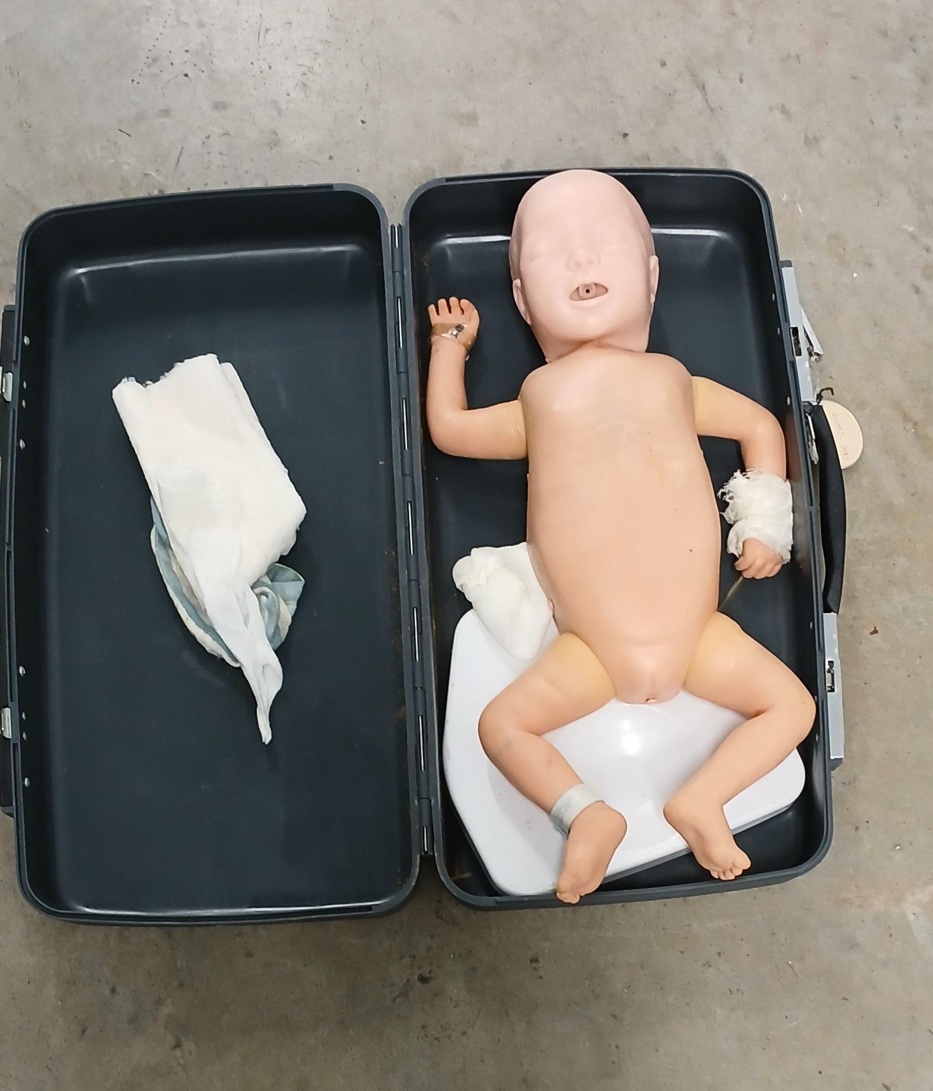 CPR Training baby doll w/ lockbox & key - image 1