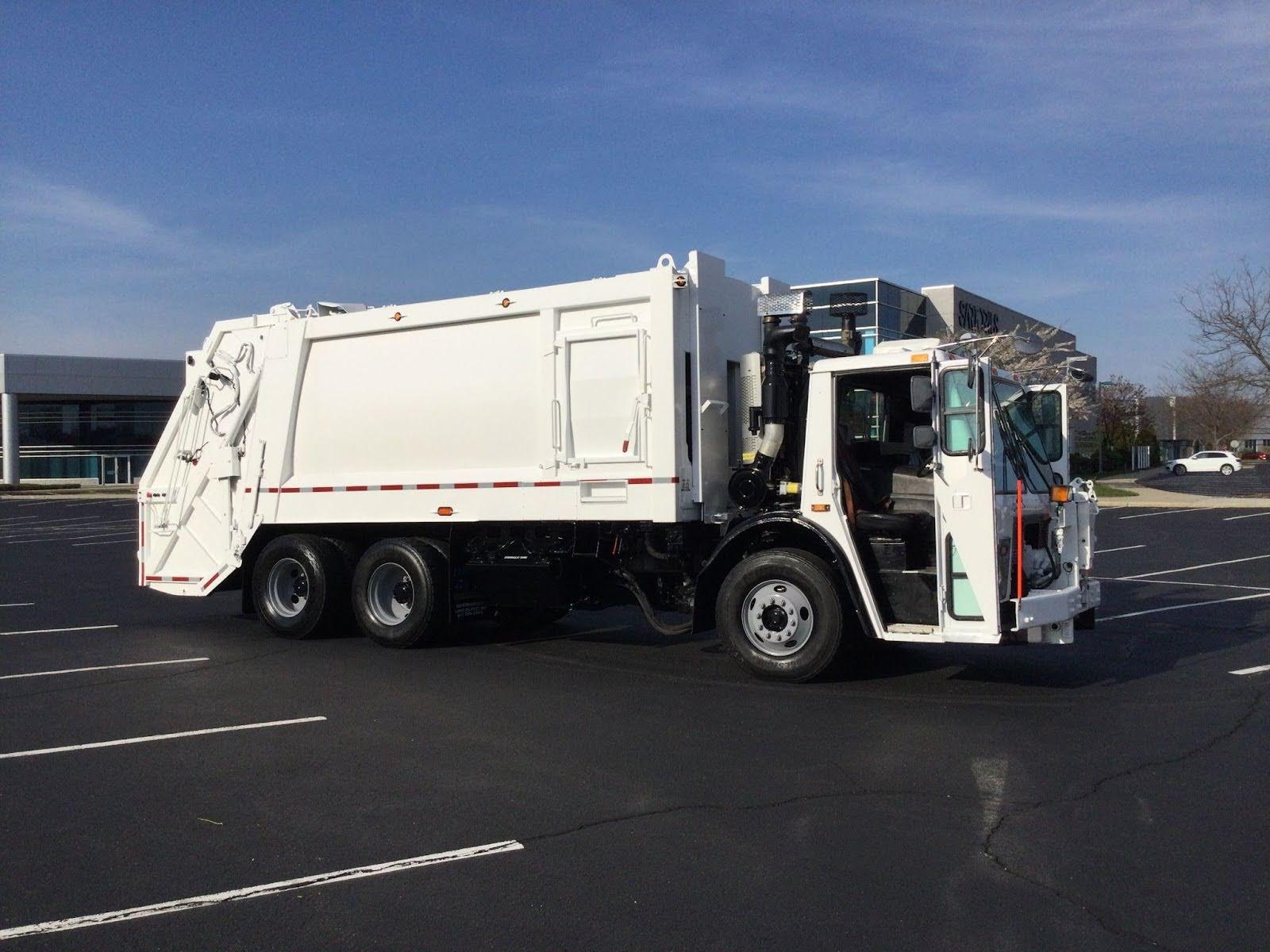 2015 Mack Heil Rear Loader - image 5