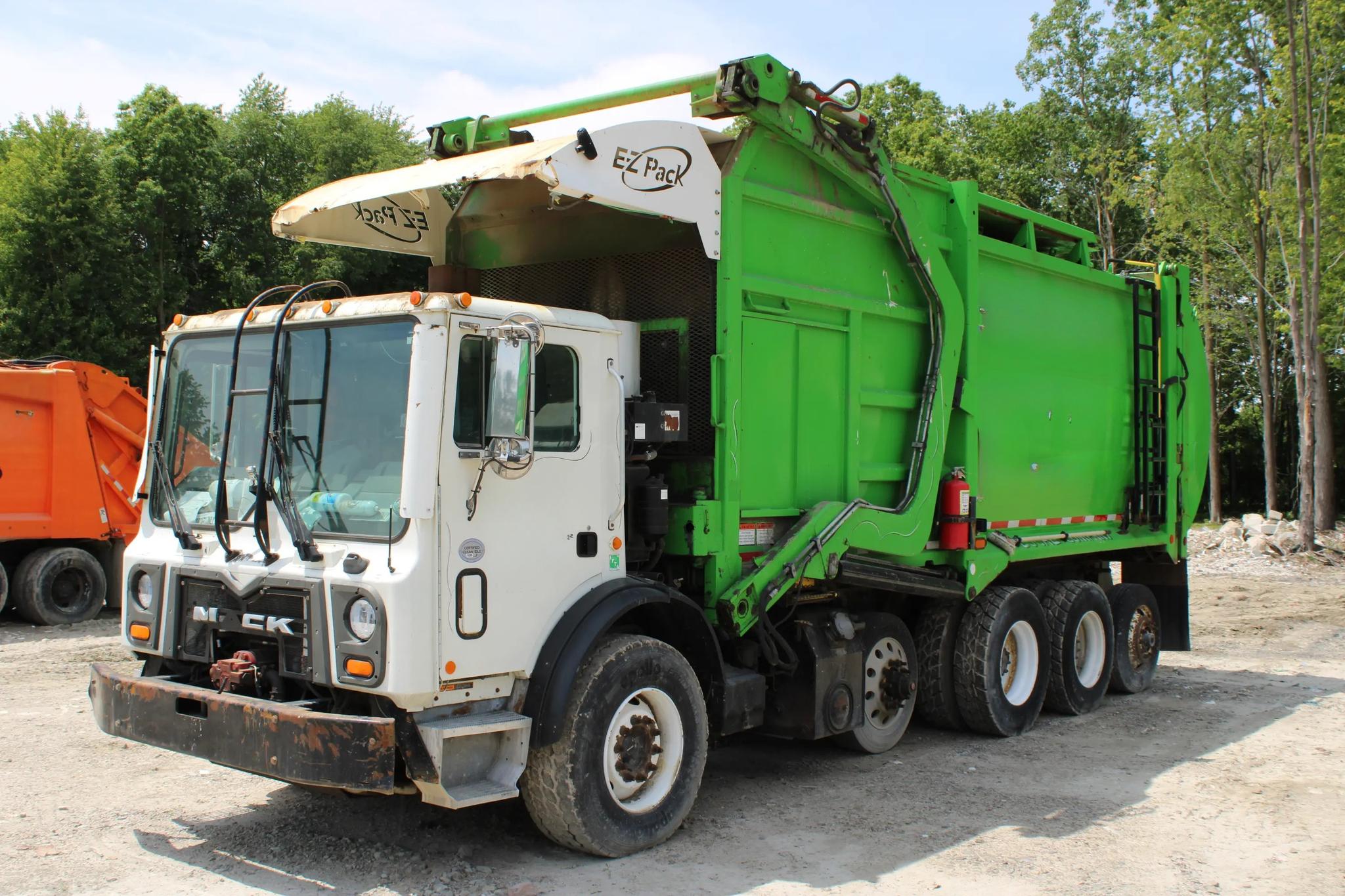 2020 Mack E-Z Pack Front Loader - image 1