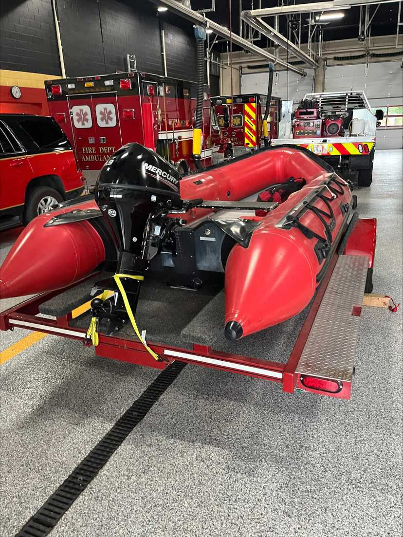 Mercury Inflatable Boat with 9.9 HP FourStroke Motor & Trailer