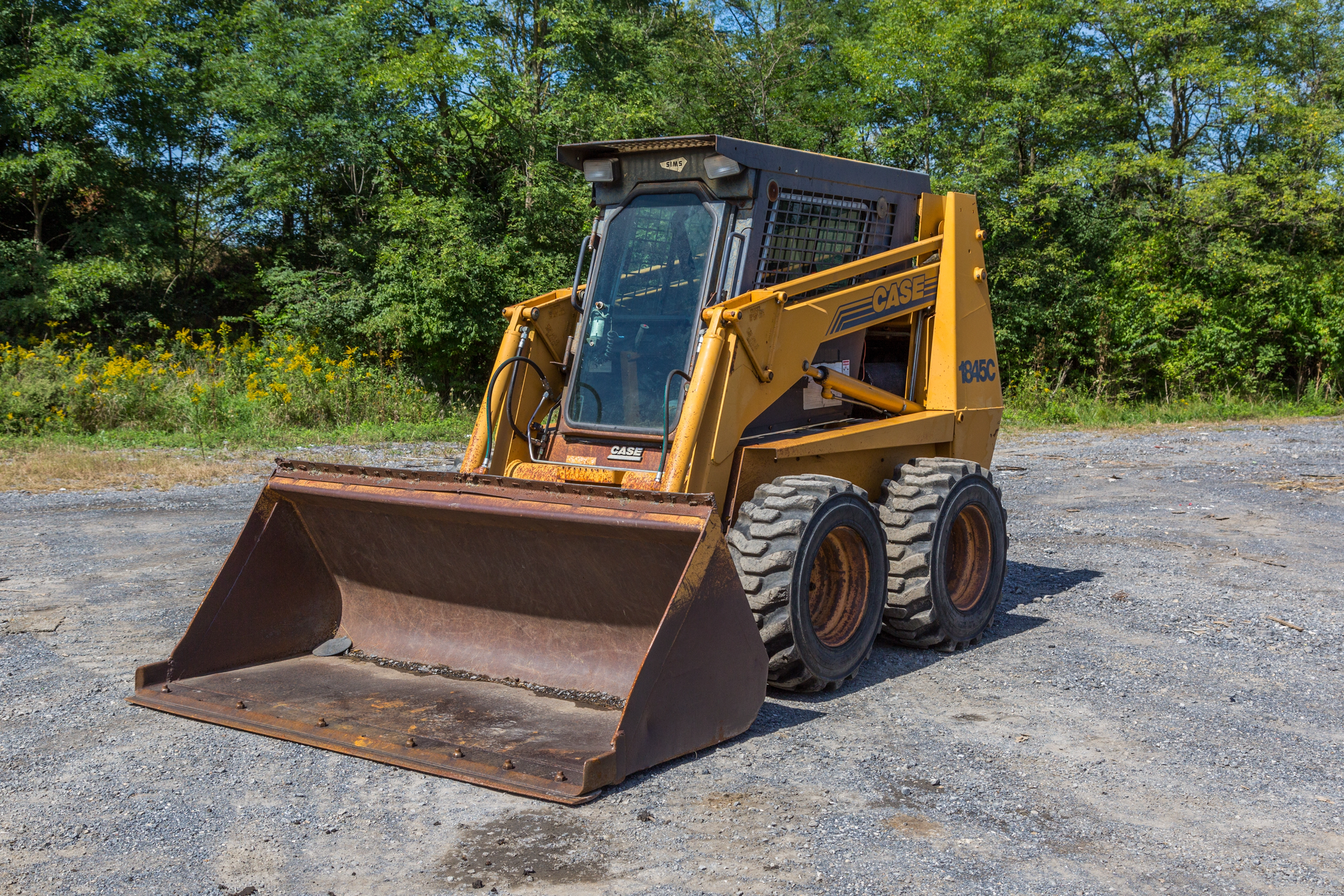 1999 Case 1845C Skid Steer Loader - image 1