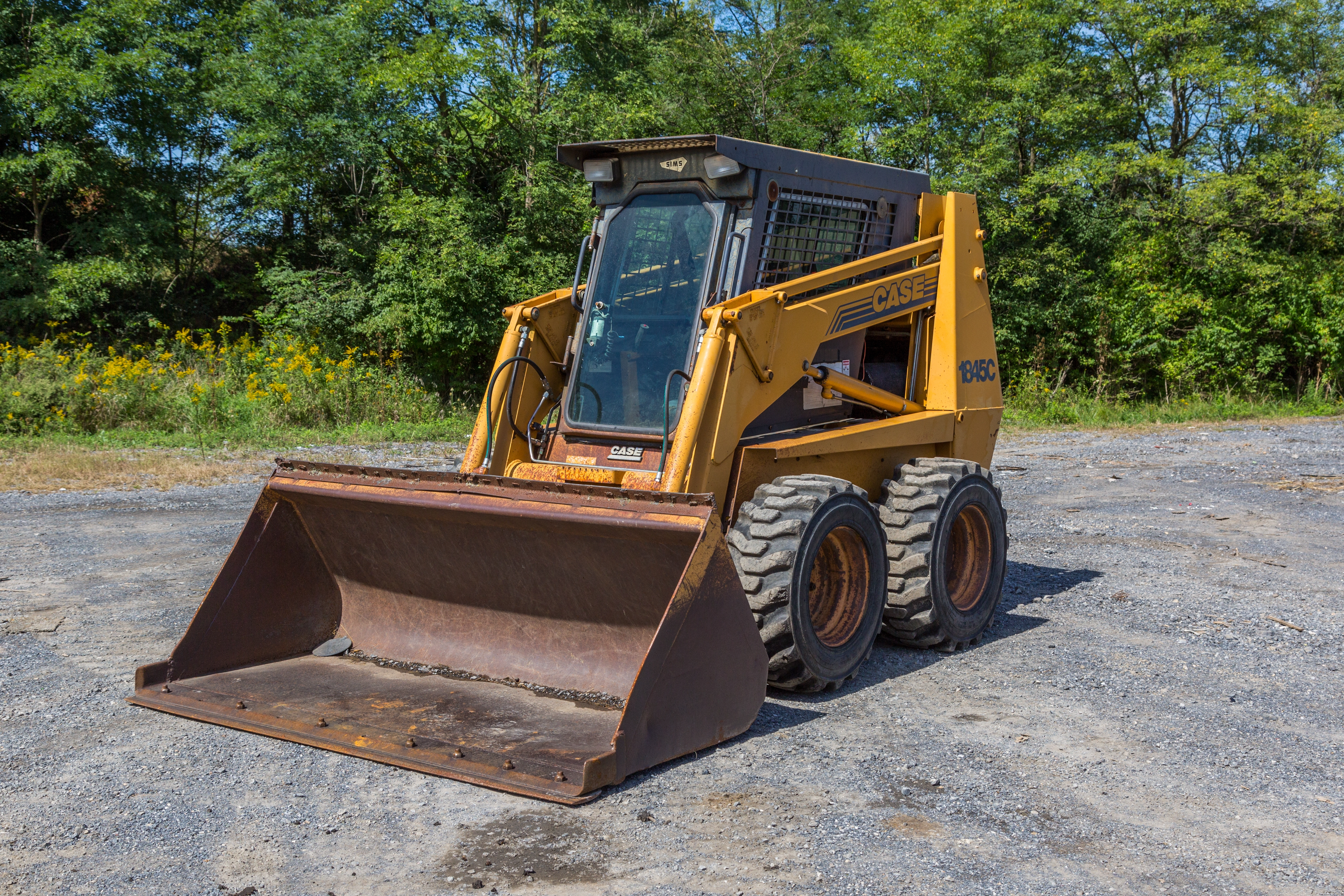 1999 Case 1845C Skid Steer Loader - image 1