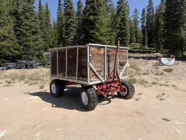 Red four wheel on mountain wagon/trailer