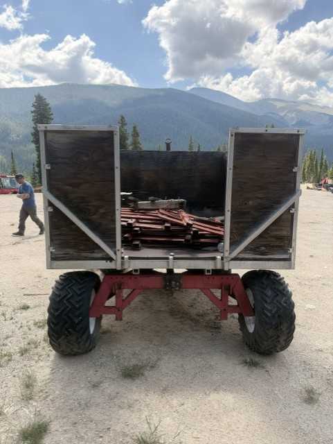 Red four wheel on mountain wagon/trailer — photo 7