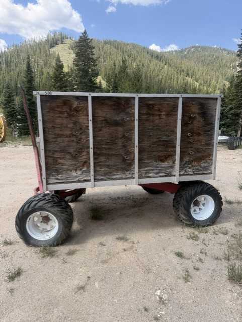 Red four wheel on mountain wagon/trailer — photo 5