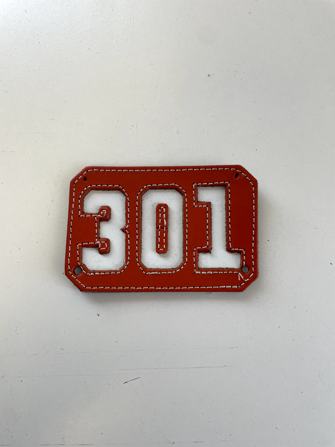 301 Red Leather Badge