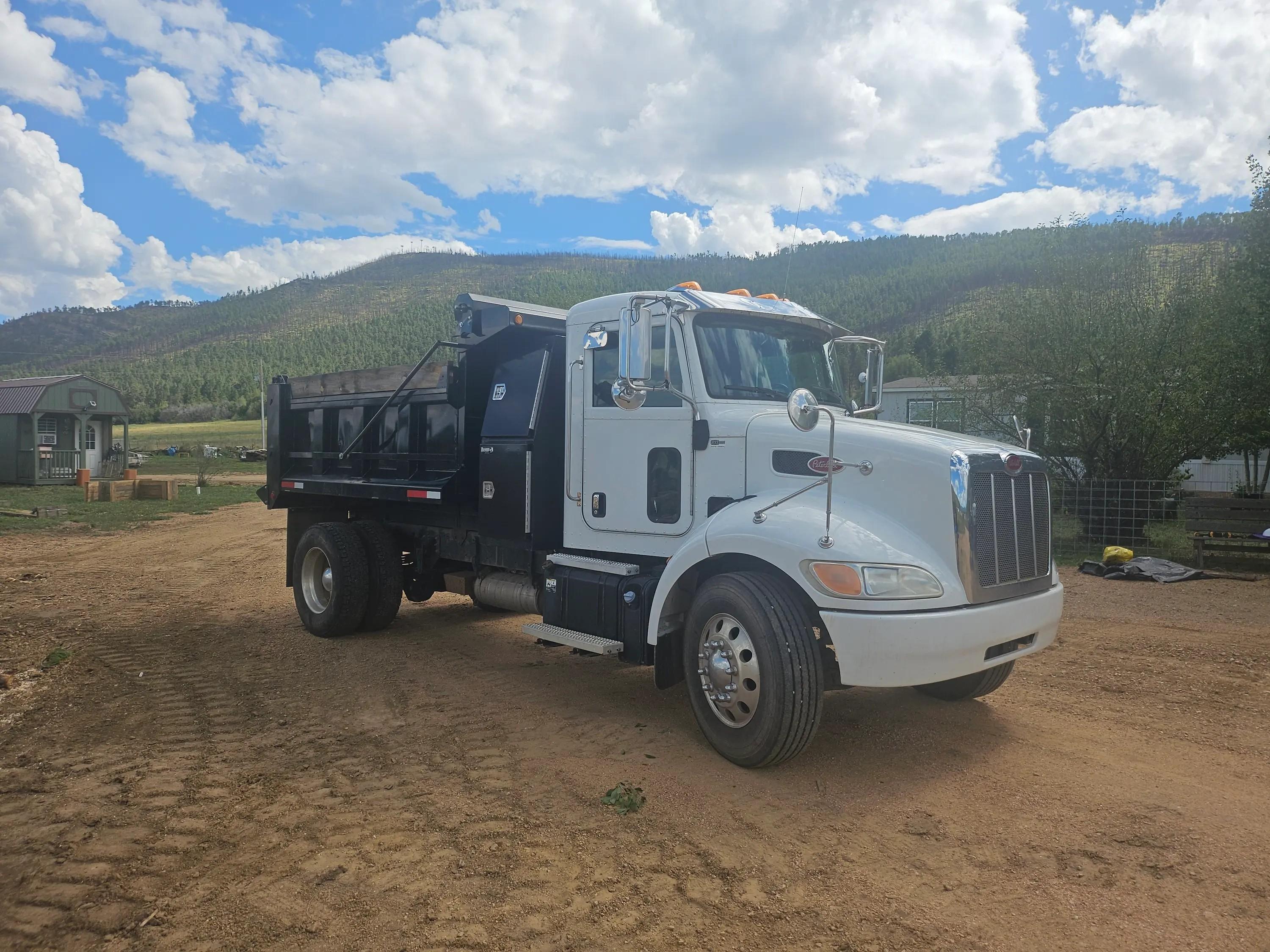 2016 Peterbilt 330 Dump Truck - image 1
