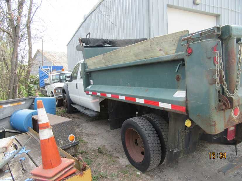 2009 Ford F550 Crew Cab with 12ft Dump — photo 3